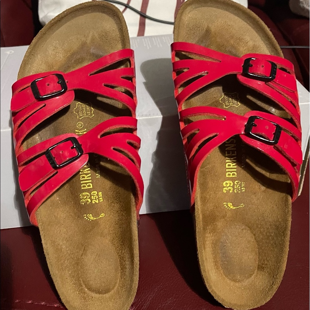 Pre-Loved, like new patent leather red Birkenstock slides.